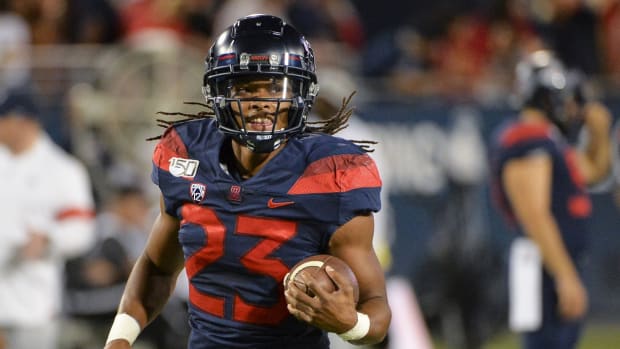 Sep 28, 2019; Tucson, AZ, USA; Arizona Wildcats running back Gary Brightwell (23) warms up before the game against the UCLA Bruins at Arizona Stadium.